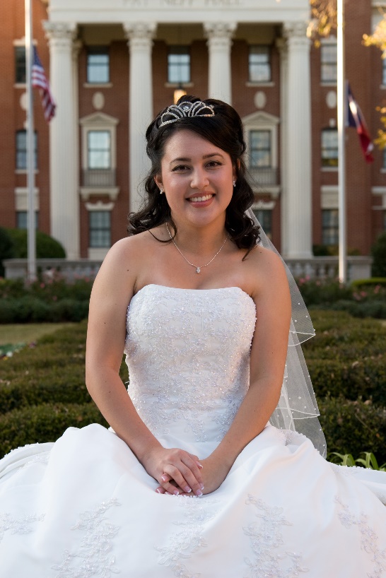 A person in a wedding dress

Description automatically generated