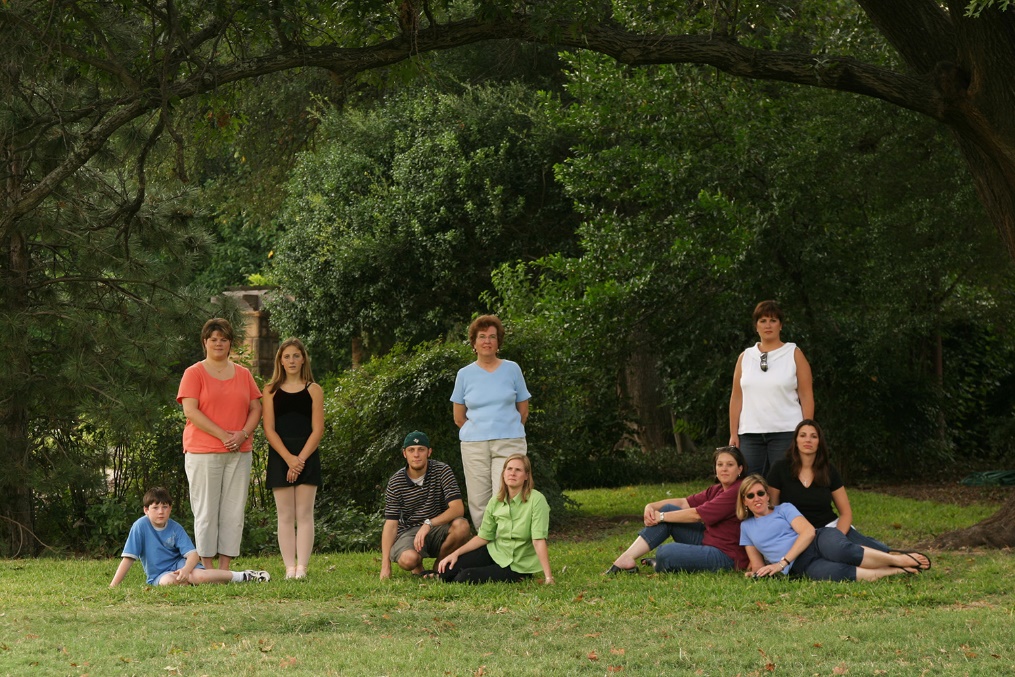 A group of people posing for a photo

Description automatically generated
