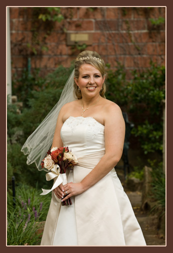 A person in a white dress holding flowers

Description automatically generated