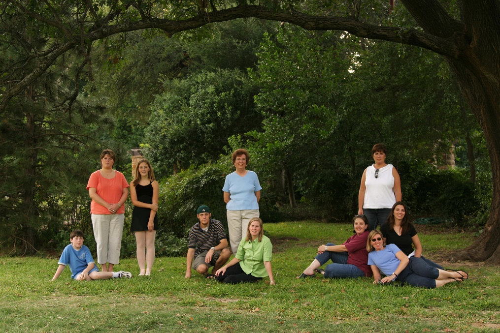 A group of people posing for a photo

Description automatically generated