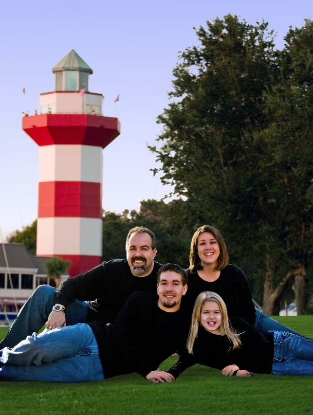 A family posing for a picture

Description automatically generated
