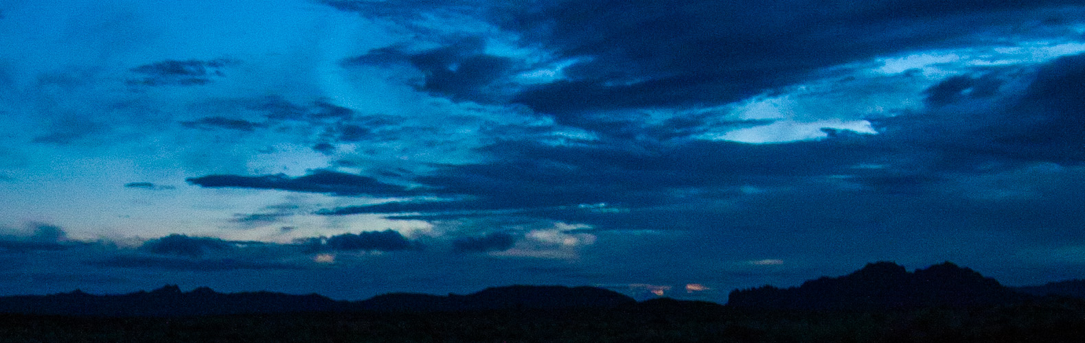 A blue sky with clouds

Description automatically generated