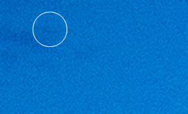 A blue surface with a white circle

Description automatically generated