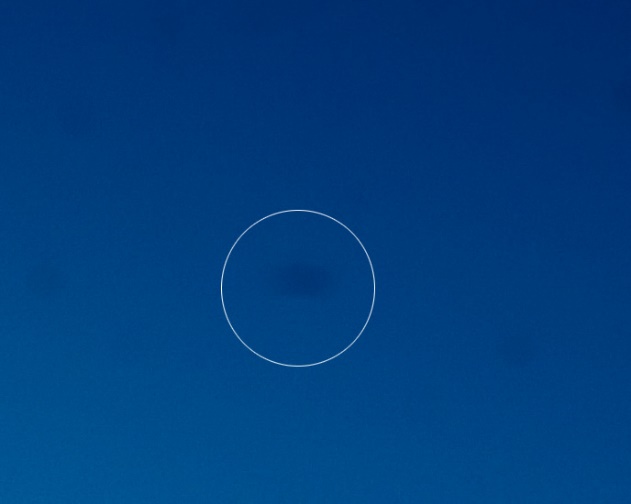 A circle in the sky

Description automatically generated